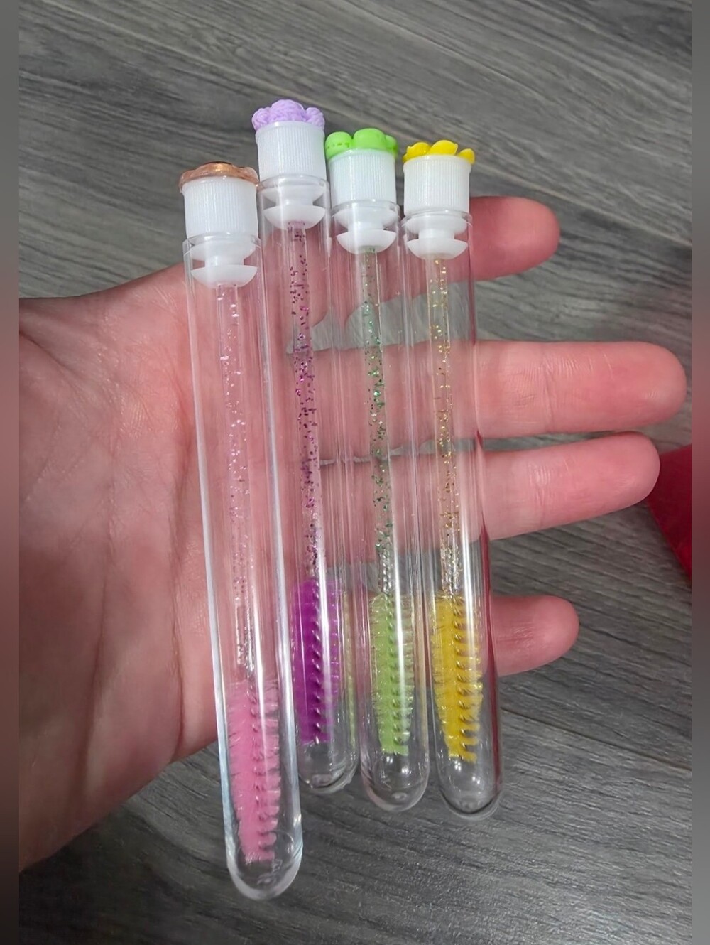 Makeup tools. Spoolies. Fancy flower charms. Glitter travel protective tubes.NEW